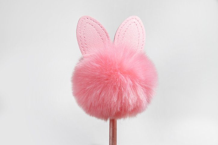 Bondara Sex Toys Blog - Happy Bunny Day - Pink pom pom with bunny ears on white background