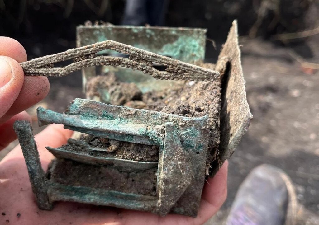 The bronze box is shaped like a temple found in Romania -
